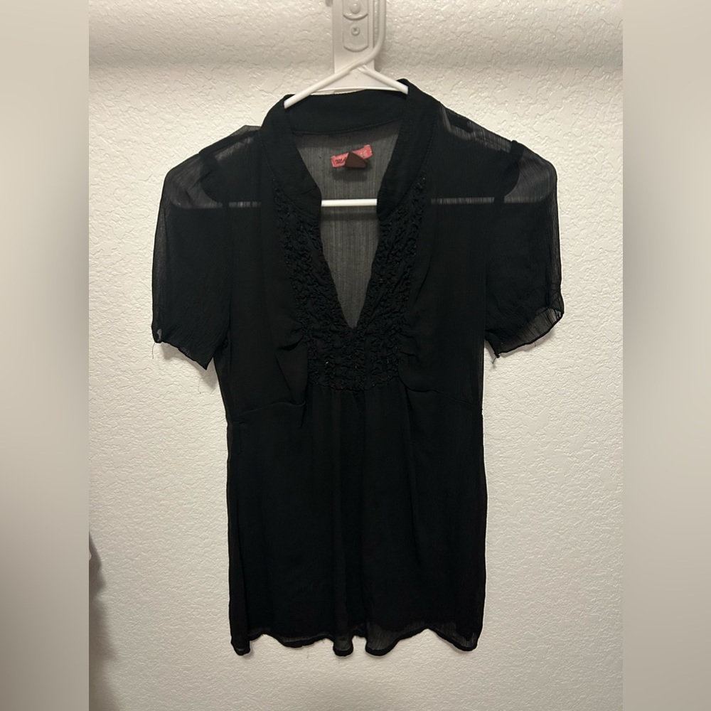 Semi worn. See through soft blouse